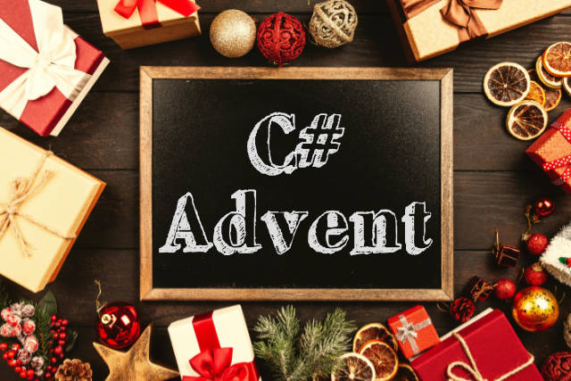 Chalkboard with the text C# Advent surrounded by Christmas gifts